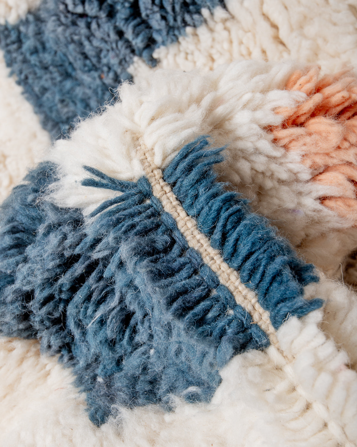 Modern, designer, handcrafted Berber rug from Morocco. Beniourain carpet with beautiful colours and patterns and fluffy wool texture.